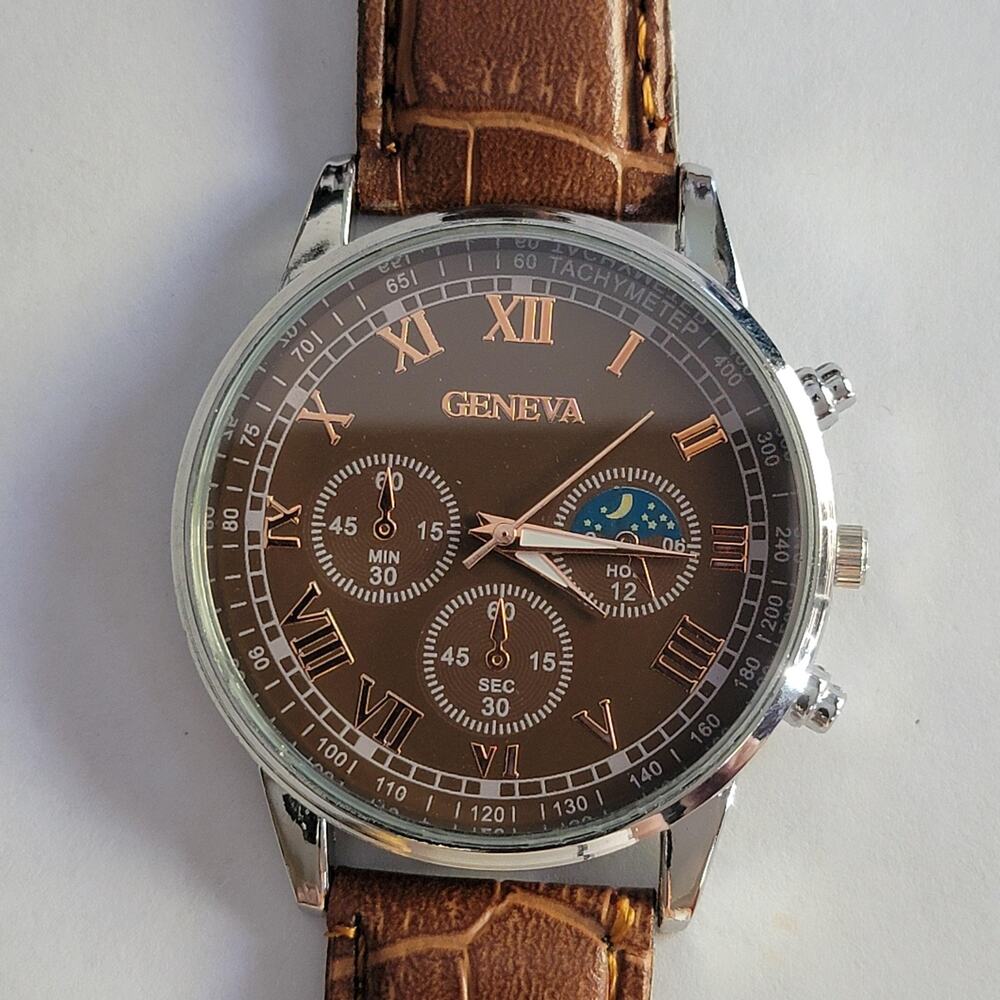 Geneva Mens Watch 40mm Silver Case Brown Dial Brown Faux Leather Strap Quartz
